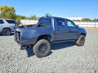 Trzecie zdjęcie samochodu z tyłu: 2023 TOYOTA TACOMA SR V6 VIN:3TMCZ5AN1PM577086 - miniatura