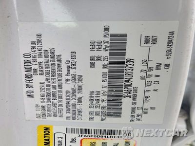 Zdjęcie 12 z 12 samochodu: 2020 FORD FUSION TITANIUM VIN:3FA6P0D94LR137239 - miniatura