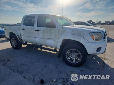 Czwarte zdjęcie samochodu z boku: 2014 TOYOTA TACOMA DOUBLE CAB VIN:5TFJX4GN2EX031936 - miniatura