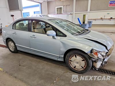 Czwarte zdjęcie samochodu z boku: 2006 HONDA CIVIC HYBRID VIN:JHMFA362X6S003517 - miniatura