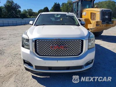 Piąte zdjęcie samochodu w środku: 2016 GMC YUKON DENALI VIN:1GKS1CKJ4GR463637 - miniatura