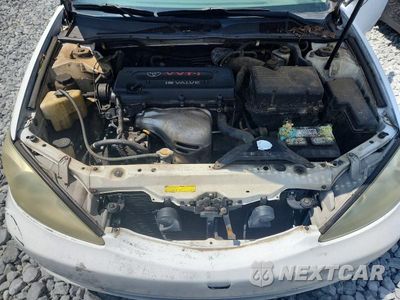 Zdjęcie 11 z 12 samochodu: 2003 TOYOTA CAMRY LE VIN:4T1BE32K23U254456 - miniatura