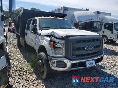 Czwarte zdjęcie samochodu z boku: 2015 FORD F550 SUPER DUTY VIN:1FD0W5GT1FEA42129 - miniatura