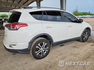Trzecie zdjęcie samochodu z tyłu: 2017 TOYOTA RAV4 LE VIN:JTMZFREV2HJ703118 - miniatura