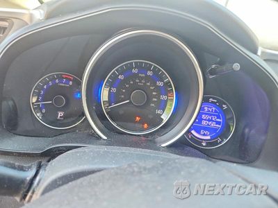 Zdjęcie 9 z 12 samochodu: 2016 HONDA FIT LX VIN:JHMGK5H57GX010109 - miniatura