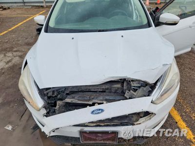 Zdjęcie 11 z 12 samochodu: 2017 FORD FOCUS SE VIN:1FADP3F29HL229994 - miniatura
