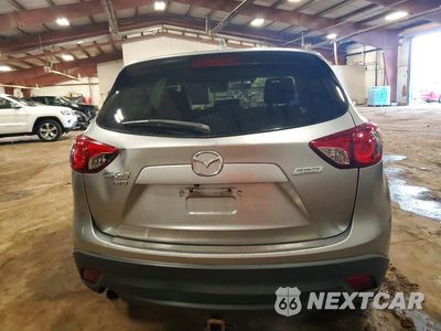 Zdjęcie 6 z 12 samochodu: 2014 MAZDA CX-5 GT VIN:JM3KE4DY1E0383544 - miniatura