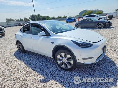 Czwarte zdjęcie samochodu z boku: 2024 TESLA MODEL Y VIN:7SAYGDEE0RA282942 - miniatura