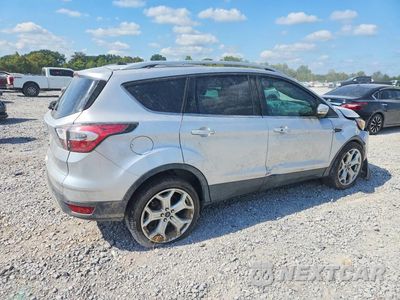 Trzecie zdjęcie samochodu z tyłu: 2017 FORD ESCAPE TITANIUM VIN:1FMCU0JD6HUA74767 - miniatura
