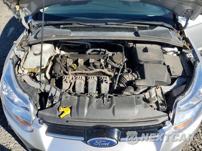 Zdjęcie 11 z 12 samochodu: 2012 FORD FOCUS VIN:1FAHP3M24CL135406 - miniatura
