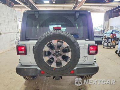 Zdjęcie 6 z 13 samochodu: 2018 JEEP WRANGLER UNLIMITED SAHARA VIN:1C4HJXEGXJW173585 - miniatura