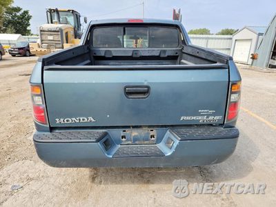 Zdjęcie 6 z 12 samochodu: 2006 HONDA RIDGELINE SPORT VIN:2HJYK16236H529471 - miniatura