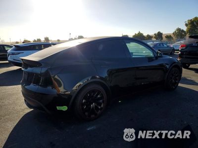 Trzecie zdjęcie samochodu z tyłu: 2023 TESLA MODEL Y VIN:7SAYGAEE0PF686161 - miniatura