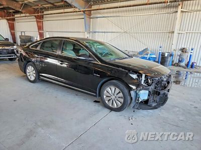 Czwarte zdjęcie samochodu z boku: 2016 HYUNDAI SONATA HYBRID SE VIN:KMHE24L16GA037047 - miniatura