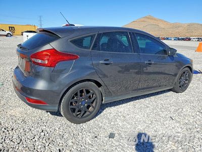 Trzecie zdjęcie samochodu z tyłu: 2016 FORD FOCUS SE VIN:1FADP3K21GL311755 - miniatura