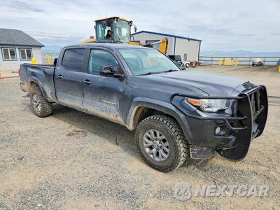 Czwarte zdjęcie samochodu z boku: 2018 TOYOTA TACOMA SR5 V6 VIN:3TMDZ5BN9JM054456 - miniatura
