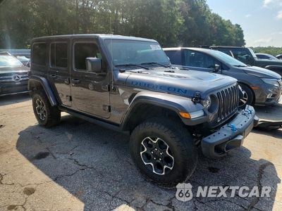 Czwarte zdjęcie samochodu z boku: 2023 JEEP WRANGLER RUBICON 4XE VIN:1C4JJXR61PW516084 - miniatura