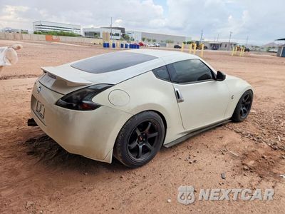 Trzecie zdjęcie samochodu z tyłu: 2016 NISSAN 370Z SPORT VIN:JN1AZ4EH5GM936041 - miniatura