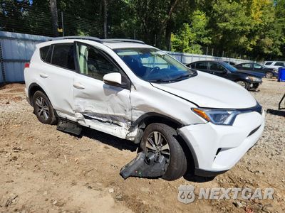 Czwarte zdjęcie samochodu z boku: 2017 TOYOTA RAV4 XLE VIN:JTMWFREV6HJ113863 - miniatura