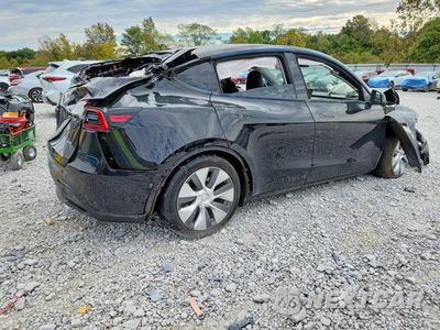 Trzecie zdjęcie samochodu z tyłu: 2023 TESLA MODEL Y VIN:7SAYGDEE5PA032772 - miniatura