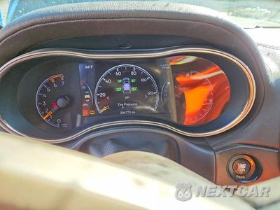 Zdjęcie 9 z 14 samochodu: 2015 JEEP GRAND CHEROKEE SUMMIT VIN:1C4RJFJT0FC861654 - miniatura