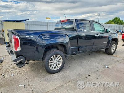 Trzecie zdjęcie samochodu z tyłu: 2016 GMC CANYON SLT VIN:1GTG6DE34G1120850 - miniatura