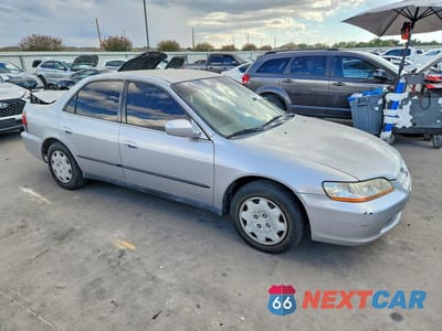 Czwarte zdjęcie samochodu z boku: 1999 HONDA ACCORD LX VIN:JHMCG6650XC027852 - miniatura