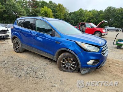 Czwarte zdjęcie samochodu z boku: 2017 FORD ESCAPE TITANIUM VIN:1FMCU9JD2HUD19004 - miniatura