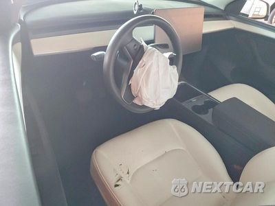 Zdjęcie 8 z 12 samochodu: 2023 TESLA MODEL Y VIN:7SAYGDEE5PF753192 - miniatura
