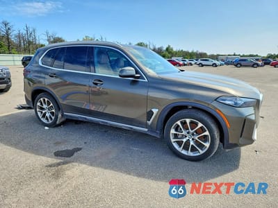 Czwarte zdjęcie samochodu z boku: 2024 BMW X5 XDRIVE40I VIN:5UX23EU02R9W08181 - miniatura