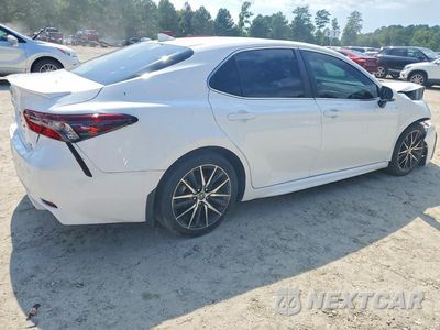 Trzecie zdjęcie samochodu z tyłu: 2024 TOYOTA CAMRY HYBRID SE VIN:4T1G31AK7RU075890 - miniatura