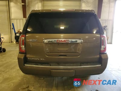 Zdjęcie 6 z 13 samochodu: 2016 GMC YUKON XL DENALI VIN:1GKS2HKJXGR126772 - miniatura