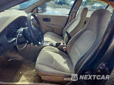 Zdjęcie 7 z 12 samochodu: 2002 SATURN SL1 VIN:1G8ZH52832Z157157 - miniatura
