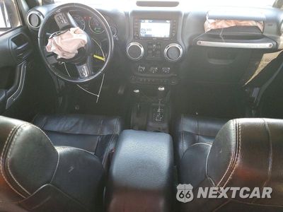 Zdjęcie 8 z 14 samochodu: 2012 JEEP WRANGLER UNLIMITED RUBICON VIN:1C4HJWFG5CL211172 - miniatura