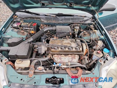 Zdjęcie 11 z 12 samochodu: 1999 HONDA CIVIC LX VIN:1HGEJ6671XL036316 - miniatura