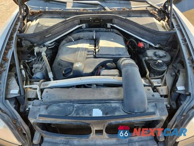 Zdjęcie 12 z 13 samochodu: 2013 BMW X5 XDRIVE35I VIN:5UXZV4C5XD0B02856 - miniatura