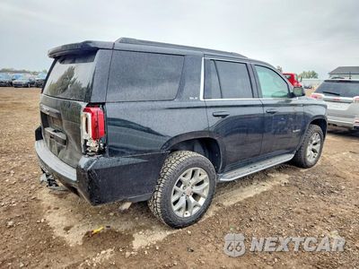 Trzecie zdjęcie samochodu z tyłu: 2019 GMC YUKON SLE VIN:1GKS2AKC5KR387809 - miniatura