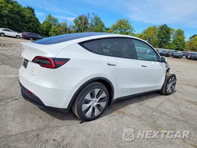 Trzecie zdjęcie samochodu z tyłu: 2022 TESLA MODEL Y VIN:7SAYGDEEXNF533544 - miniatura