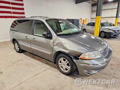 Czwarte zdjęcie samochodu z boku: 2003 FORD WINDSTAR SE VIN:2FMZA52433BB22903 - miniatura
