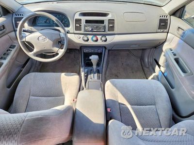 Zdjęcie 8 z 12 samochodu: 2003 TOYOTA CAMRY LE VIN:JTDBE32K630157434 - miniatura