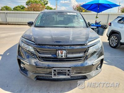 Piąte zdjęcie samochodu w środku: 2022 HONDA PILOT SPORT VIN:5FNYF5H33NB038229 - miniatura