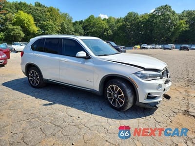 Czwarte zdjęcie samochodu z boku: 2016 BMW X5 XDRIVE50I VIN:5UXKR6C55G0J81453 - miniatura