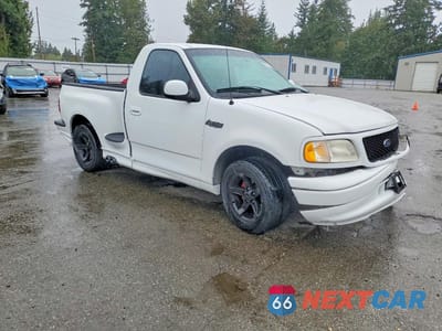 Czwarte zdjęcie samochodu z boku: 2000 FORD F150 SVT LIGHTNING VIN:2FTZF0738YCA82702 - miniatura