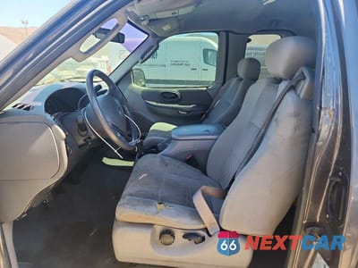 Zdjęcie 7 z 12 samochodu: 2003 FORD F150 VIN:1FTRX17213NA99497 - miniatura