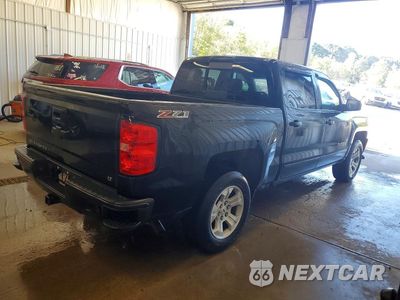 Trzecie zdjęcie samochodu z tyłu: 2017 CHEVROLET SILVERADO K1500 LT VIN:3GCUKREC4HG338592 - miniatura