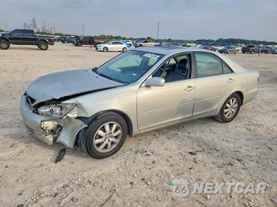 2002 TOYOTA CAMRY XLE JTDBE30K820076050 - główne zdjęcie licytacji z USA - miniatura