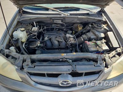Zdjęcie 11 z 12 samochodu: 2003 MAZDA TRIBUTE LX VIN:4F2YZ04103KM07384 - miniatura