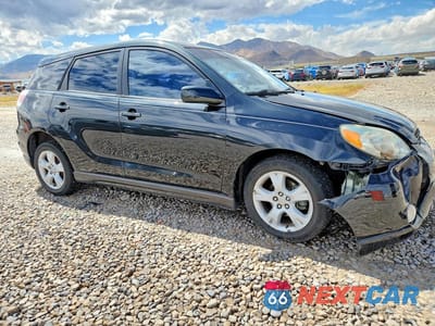 Czwarte zdjęcie samochodu z boku: 2006 TOYOTA MATRIX XR VIN:2T1LR30E96C556659 - miniatura