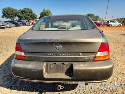 Zdjęcie 6 z 13 samochodu: 1999 NISSAN ALTIMA XE VIN:1N4DL01D4XC120019 - miniatura