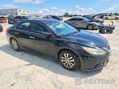 Czwarte zdjęcie samochodu z boku: 2016 NISSAN ALTIMA 2.5 S VIN:1N4AL3APXGN320423 - miniatura